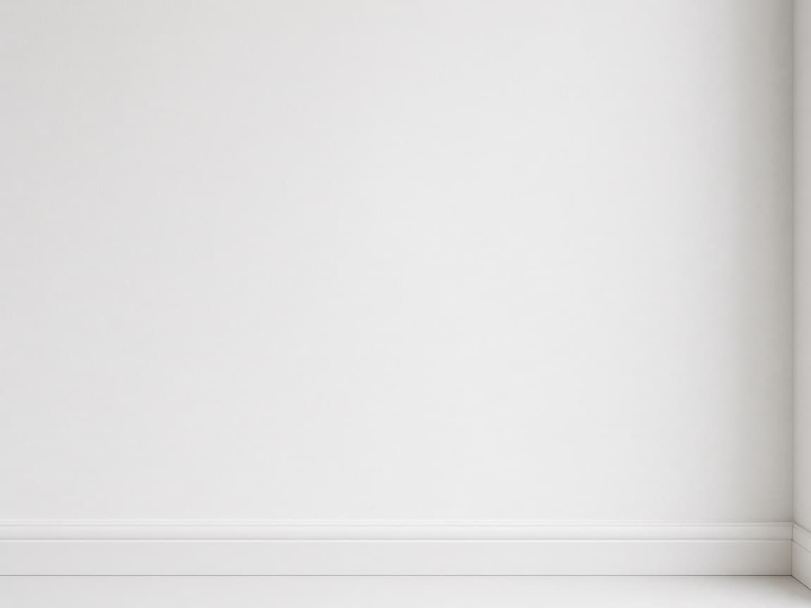 Seamless drywall patch blended into a finished white wall